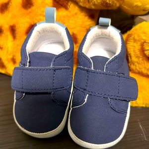 Blue velcro strap shoe